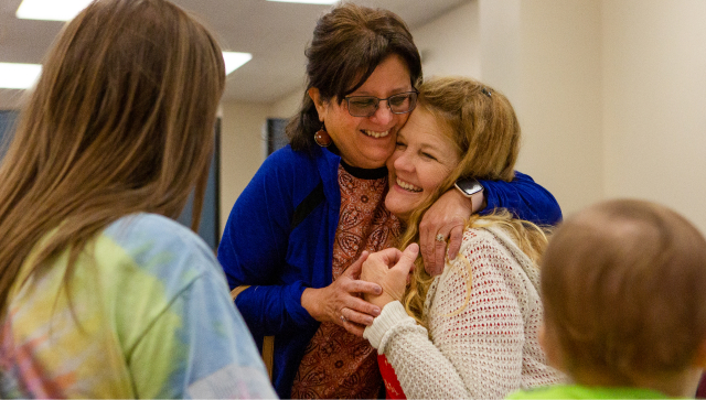 women hugging